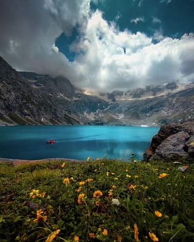 `Beautiful Rama Lake with crystal clear blue water, a must-see destination among places to visit in Astore Valley`