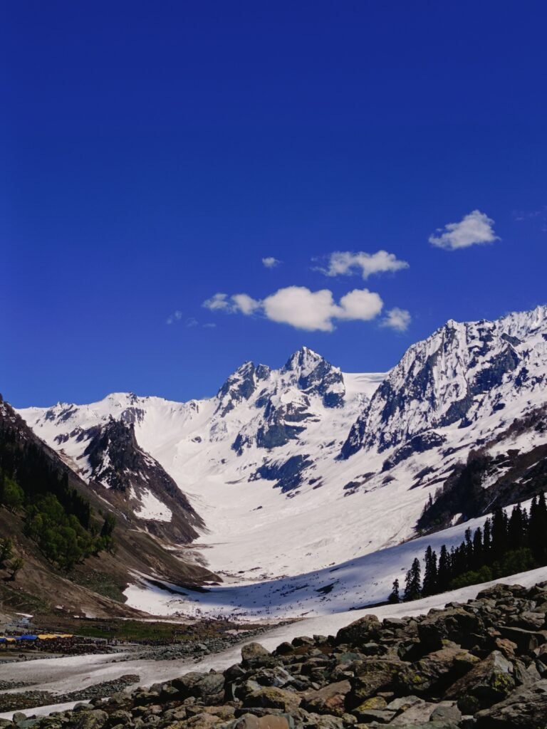 Snow-covered peaks and glacial valley of Mazino Pass, a challenging trekking destination among places to visit in Astore Valley